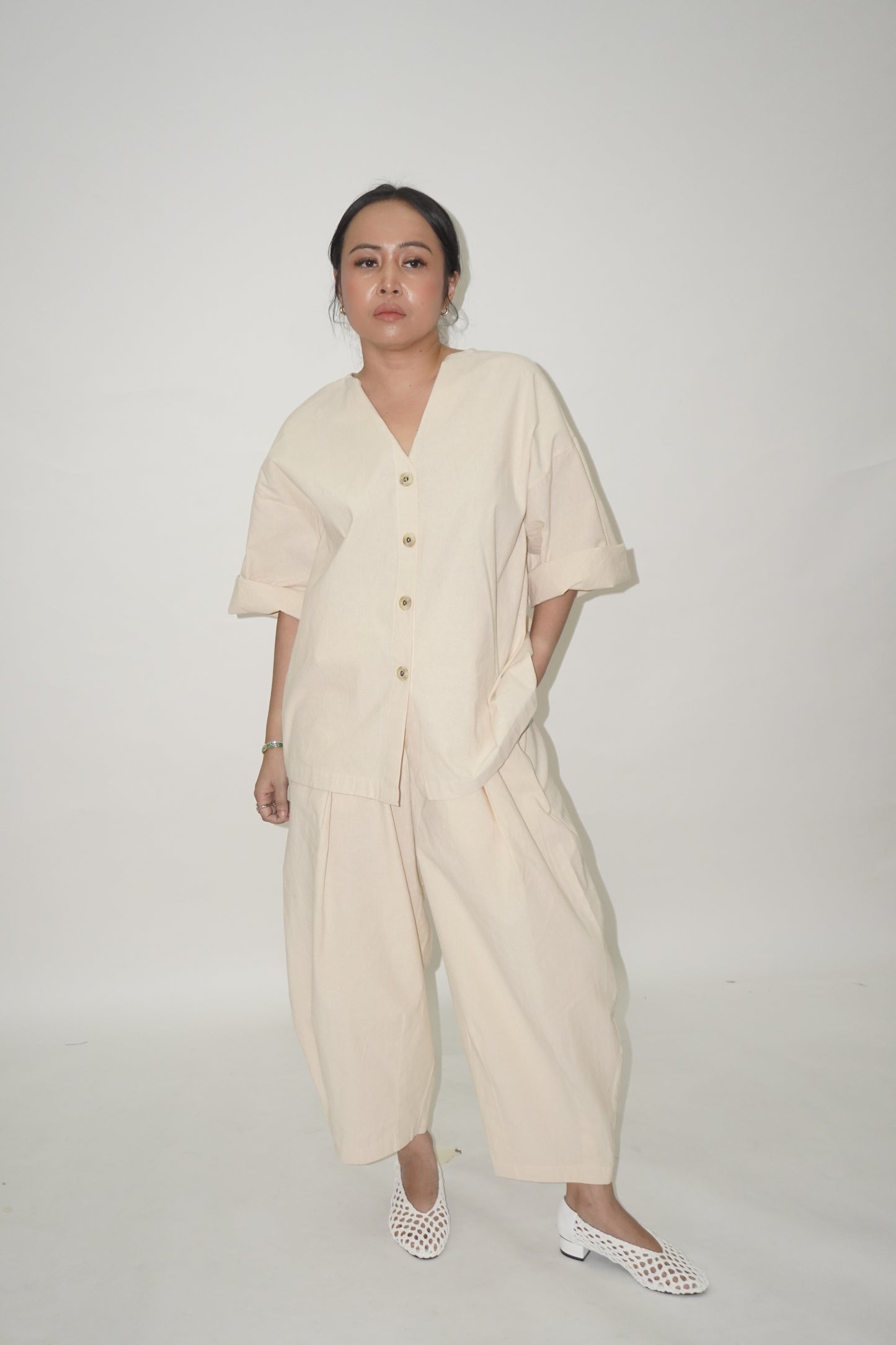 Baju Norma Beige TIGA-9